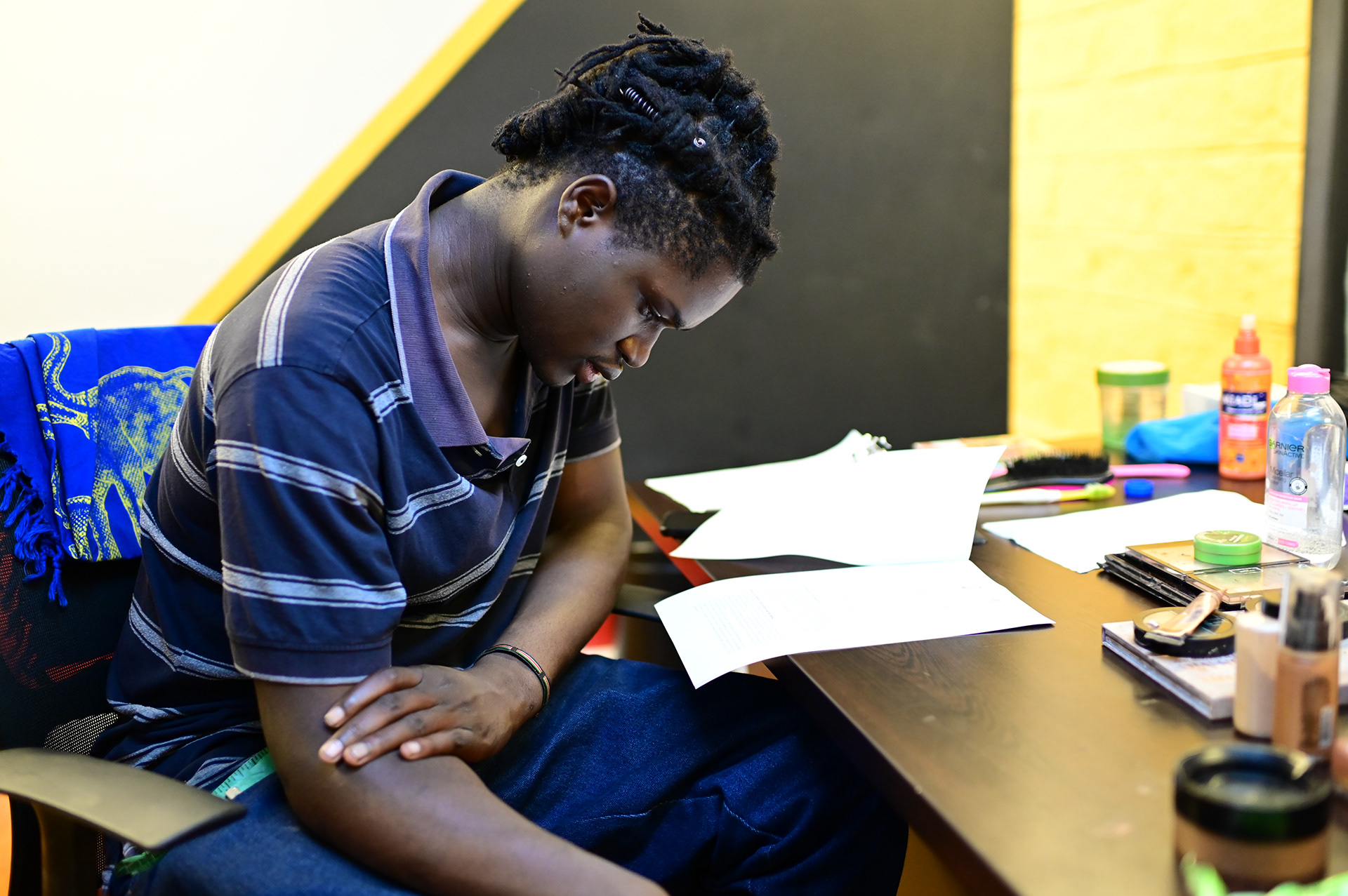 David Avido going through the contract for the screening project at the Multi Choise Studios in Nairobi