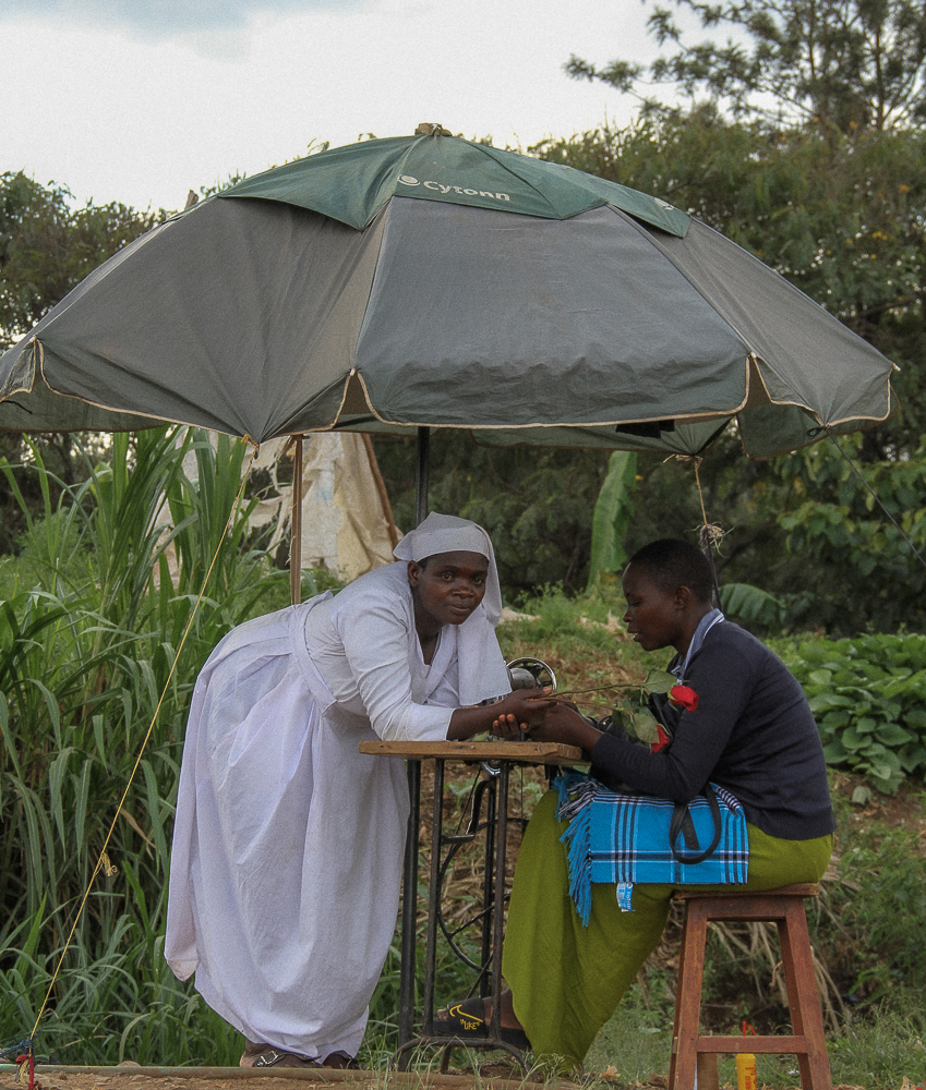Women having a conversation at their work place near the site of the exhibition